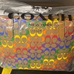 Coach purse in original packaging. Never been opened or carried